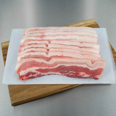 Poitrine de porc avec os tranchée 800 g env. (8 tranches de 100 g)
