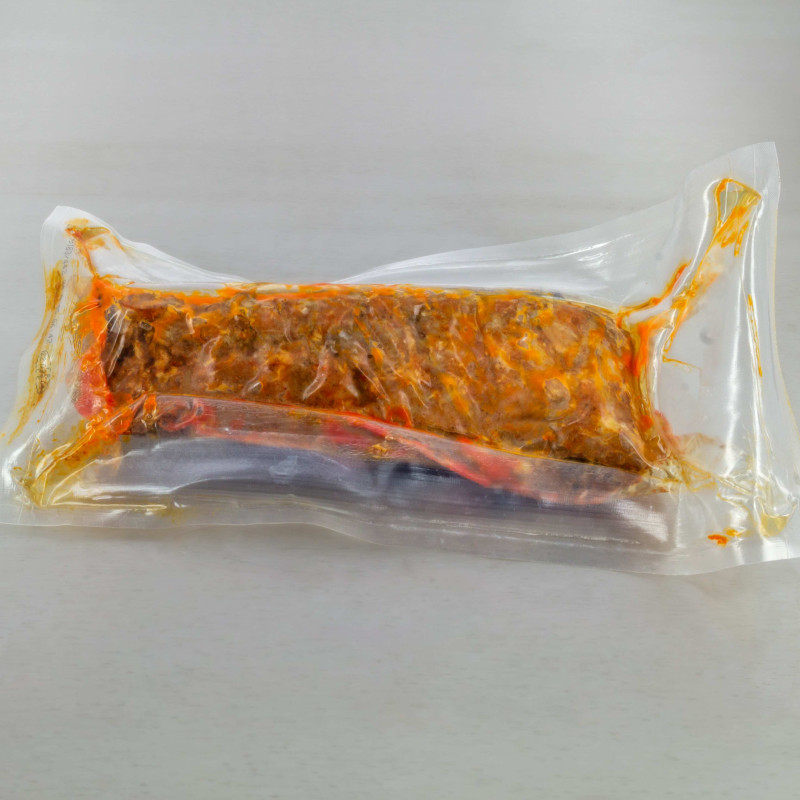 Ribs de porc mariné cuit saveur barbecue 500 g env. - vue principale du produit Ribs de porc mariné cuit saveur barbecue 500 g env. - vue principale du produit